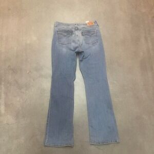 Levi's women's blue classic bootcut jeans wide leg flare stretch 32